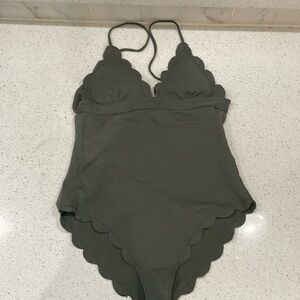 Swimming suit good condition I think is olive color